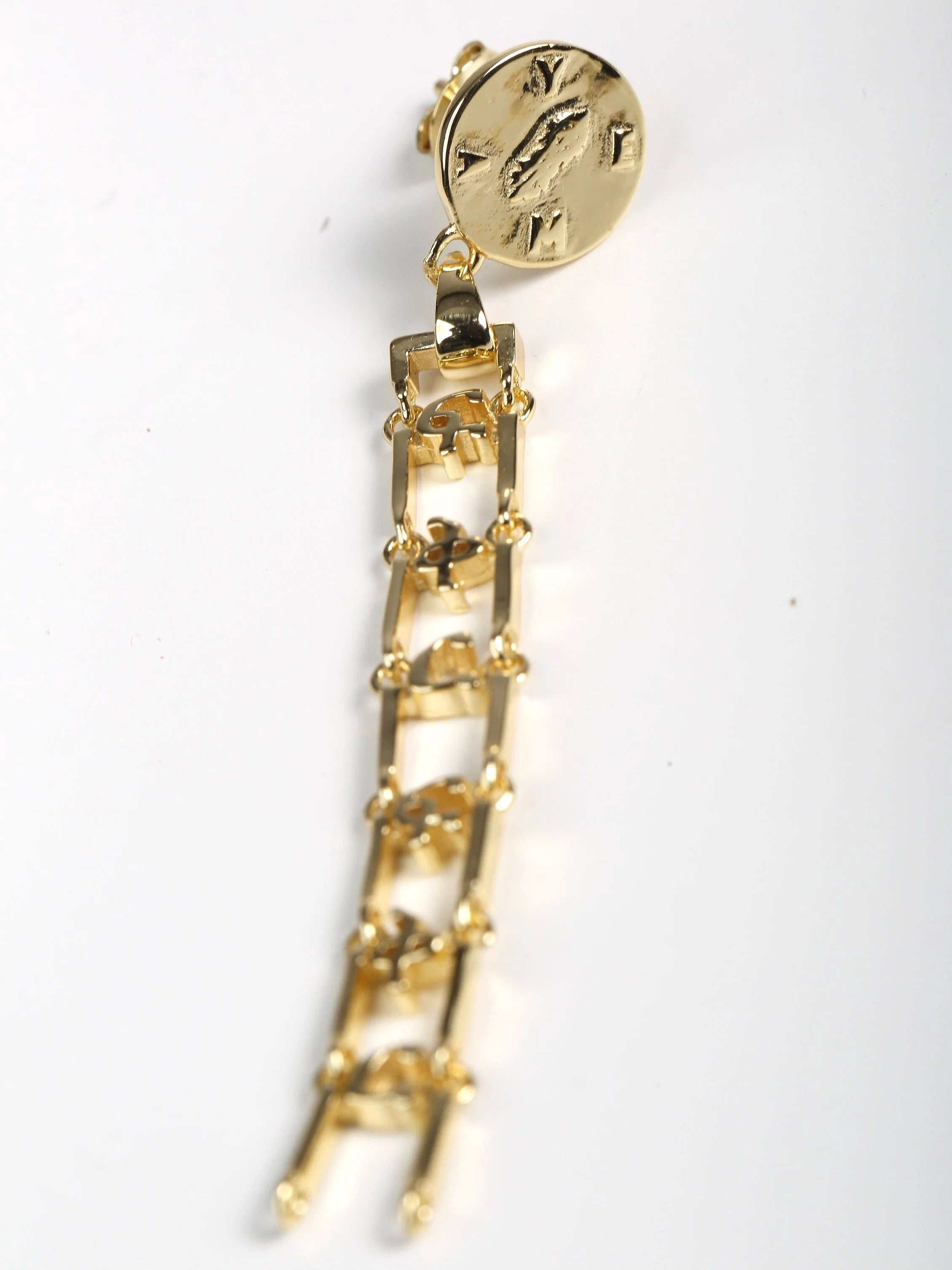 Hawi Yema AND earrings showing elegant 2-inch drop length with Ethiopian heritage symbolism