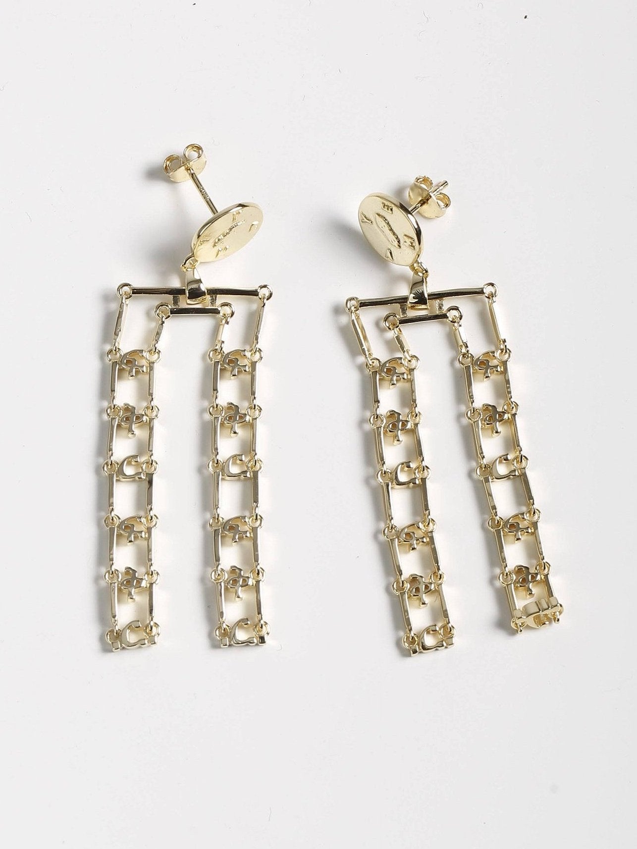 Hawi Yema Hulet earrings showing elegant layered 2-inch drop length with Ethiopian heritage symbolism