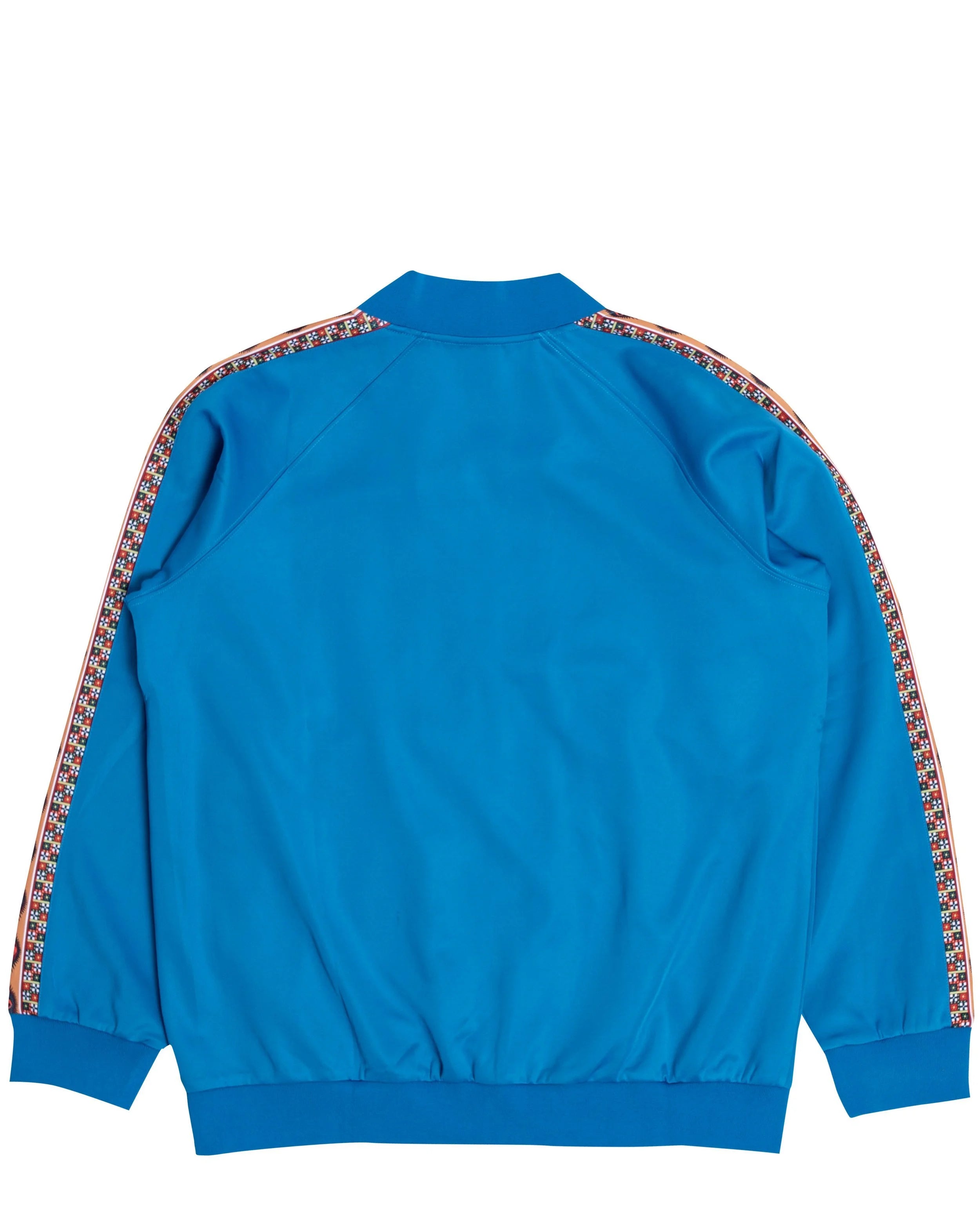 YEMA Classic track jacket in Kibera Blue featuring 17th century Abyssinian angels motif