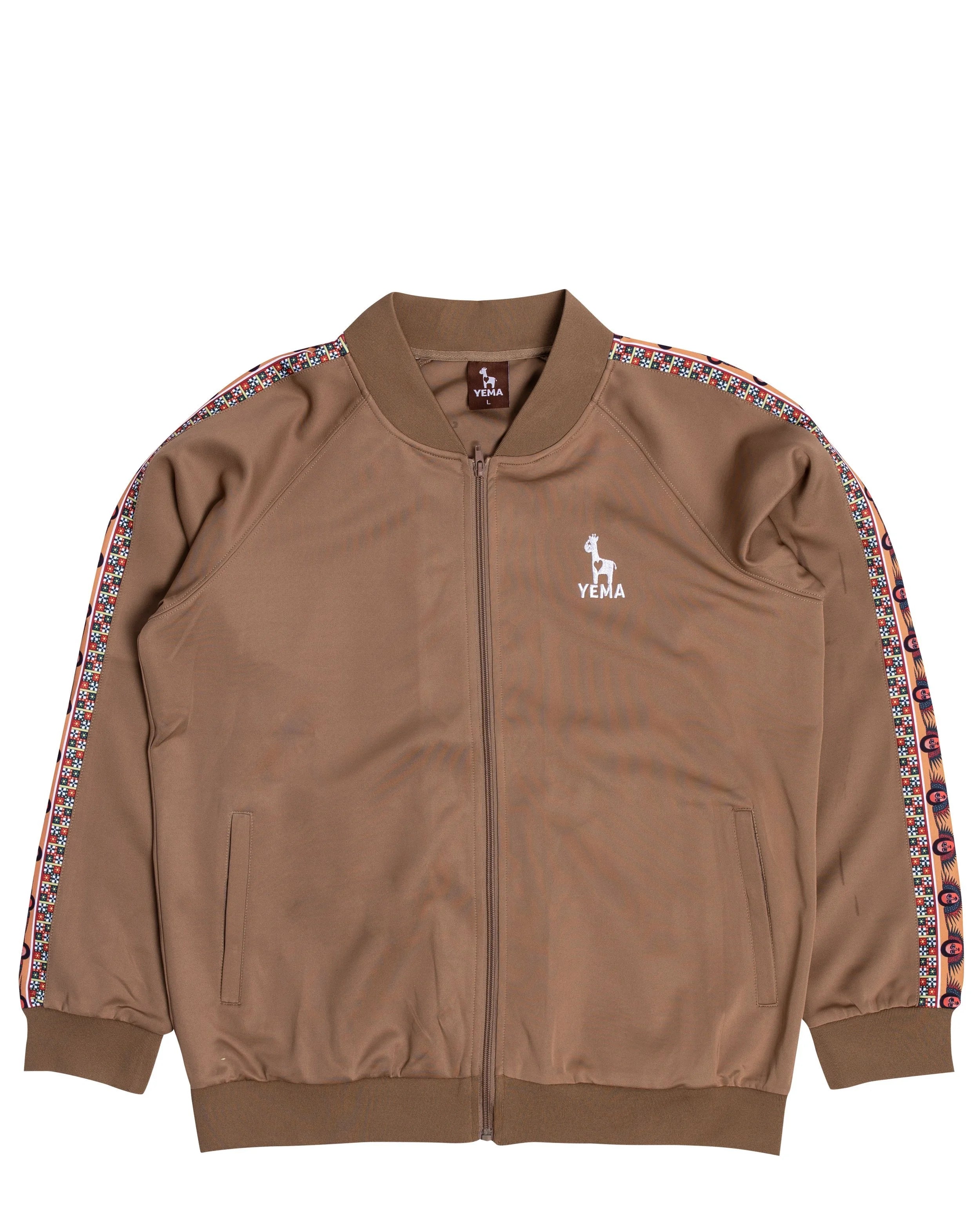 Front view of YEMA track jacket showing full zip and skating giraffe logo with Abyssinian angel pattern
