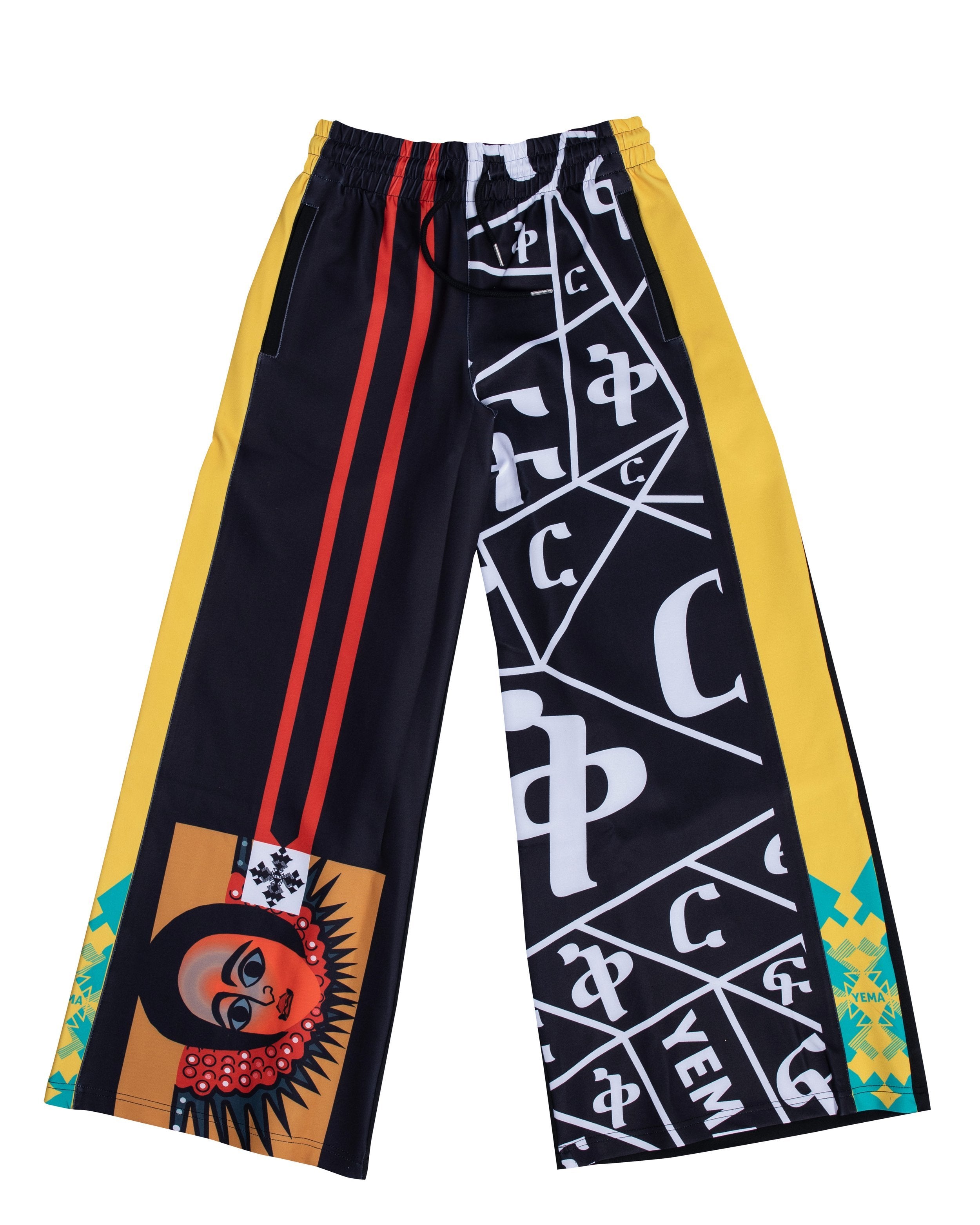 Front view of Ethiopian heritage wide-leg pants showing ancient motifs and comfortable silhouette