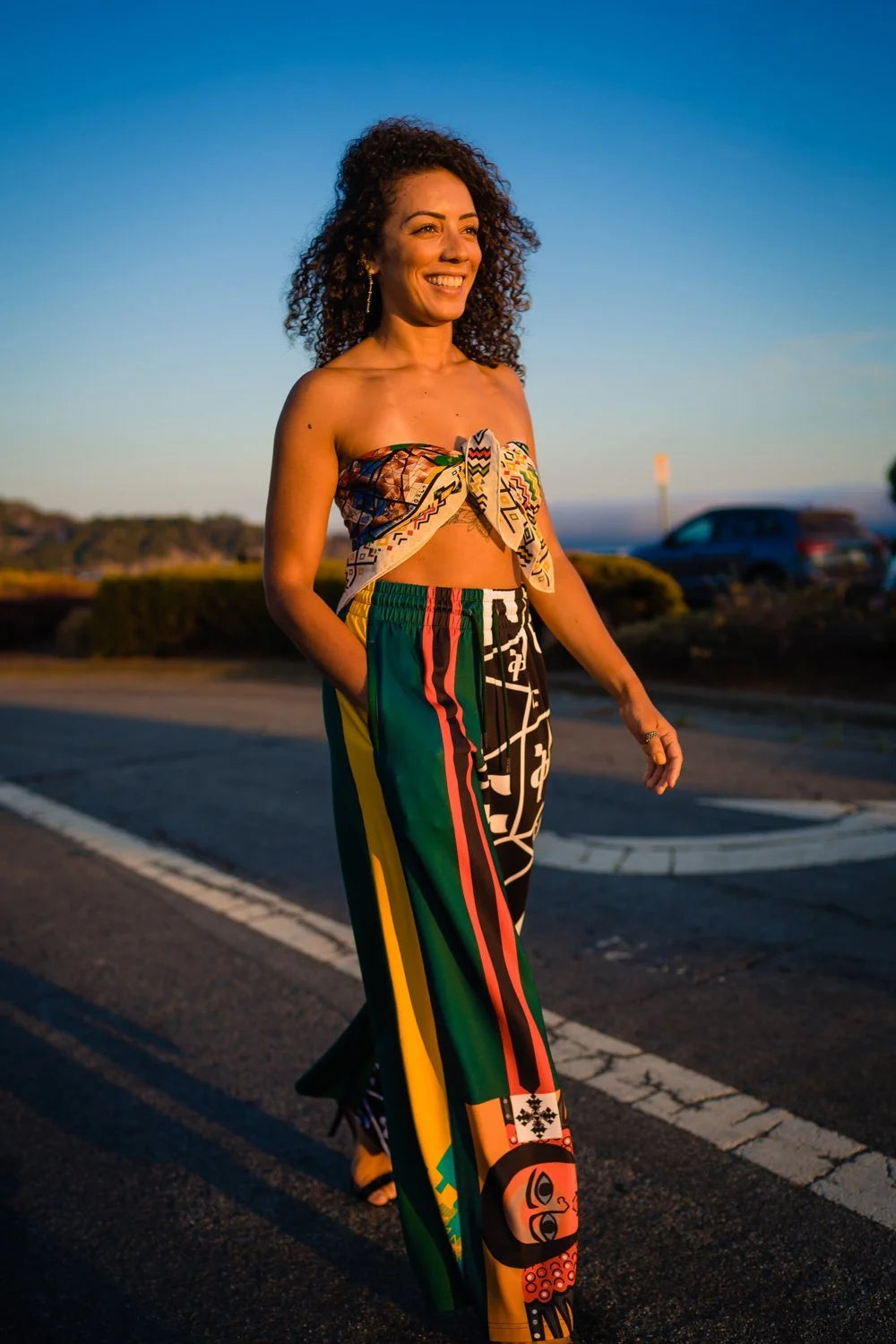 YEMA Jill Hamer pants in Addis Green featuring Amharic alphabets and Ethiopian motifs with wide relaxed fit