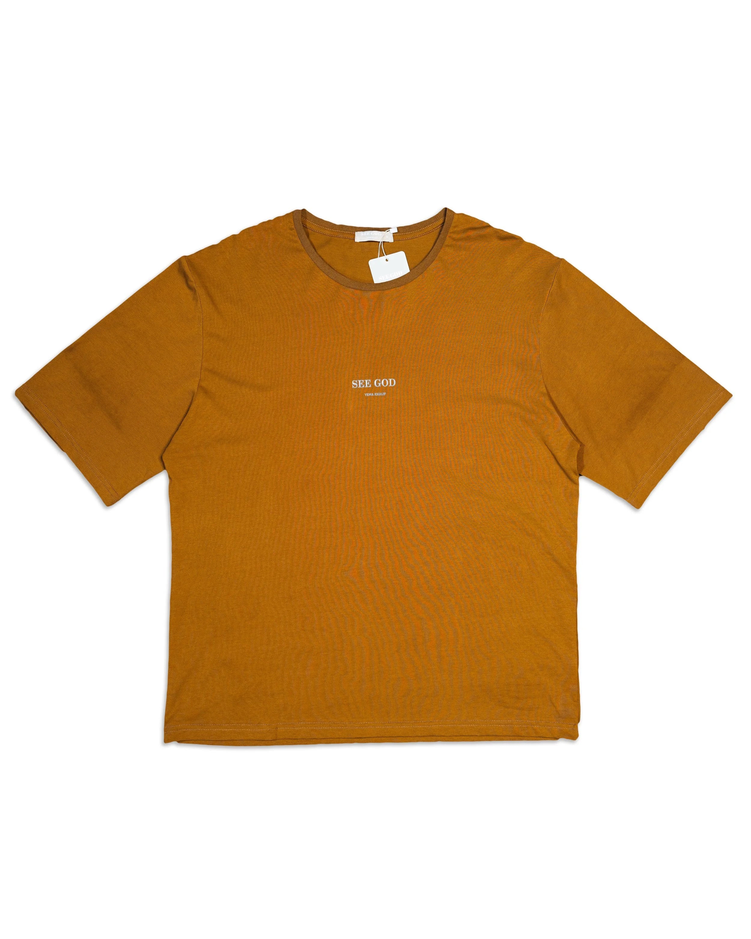 SEE GOD t-shirt in caramel ochre featuring signature logo and soft 100% cotton construction