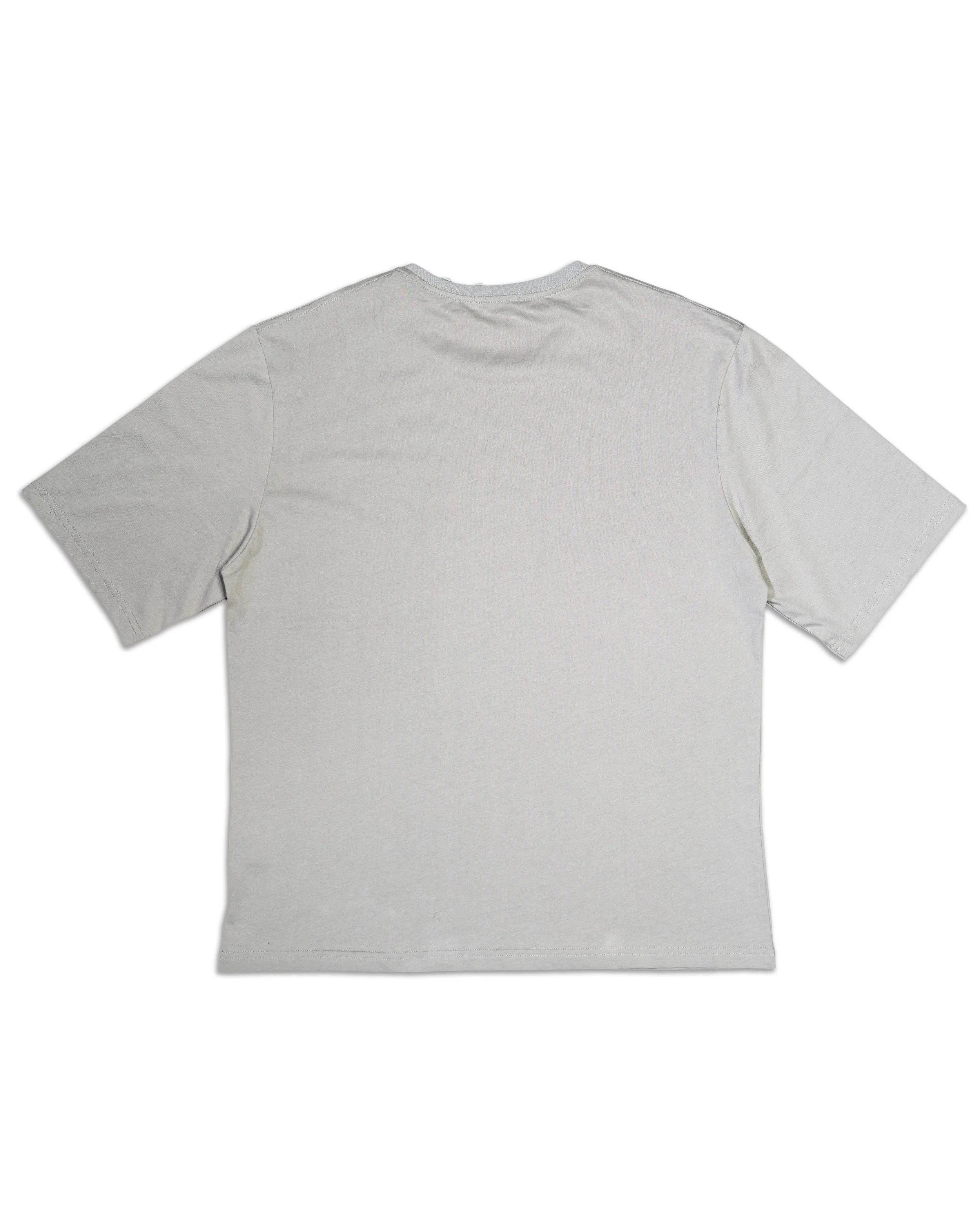 Back view of grey SEE GOD tee showing YEMA KHALIF comfortable design