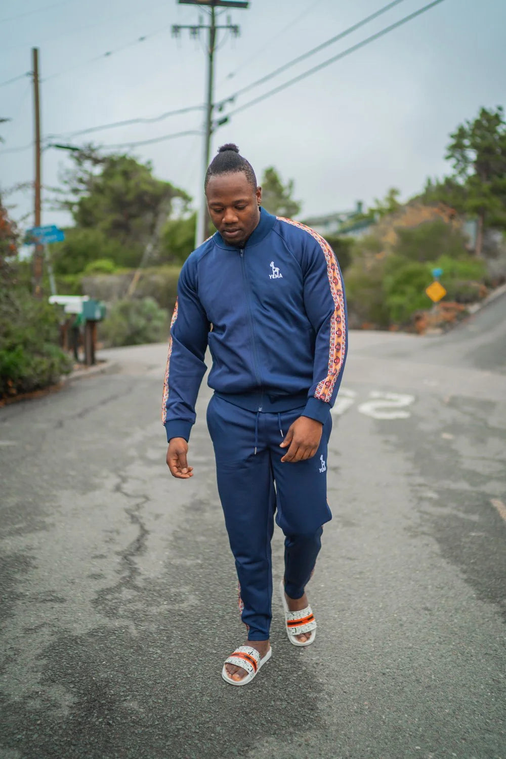 Premium track jacket featuring 17th century Abyssinian symbolism with YEMA signature details