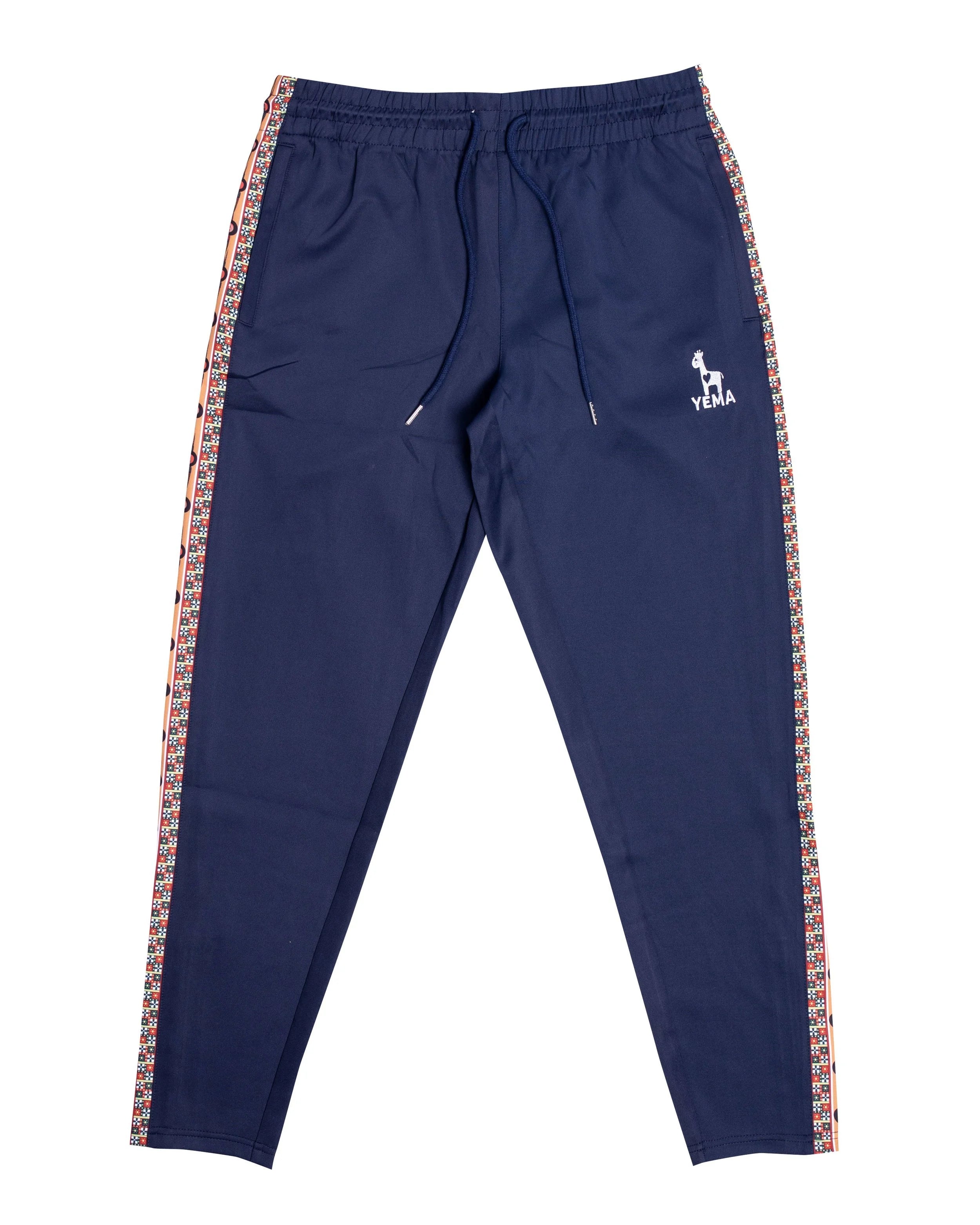 YEMA Classic track pants in Navy featuring 17th century Abyssinian angels motif