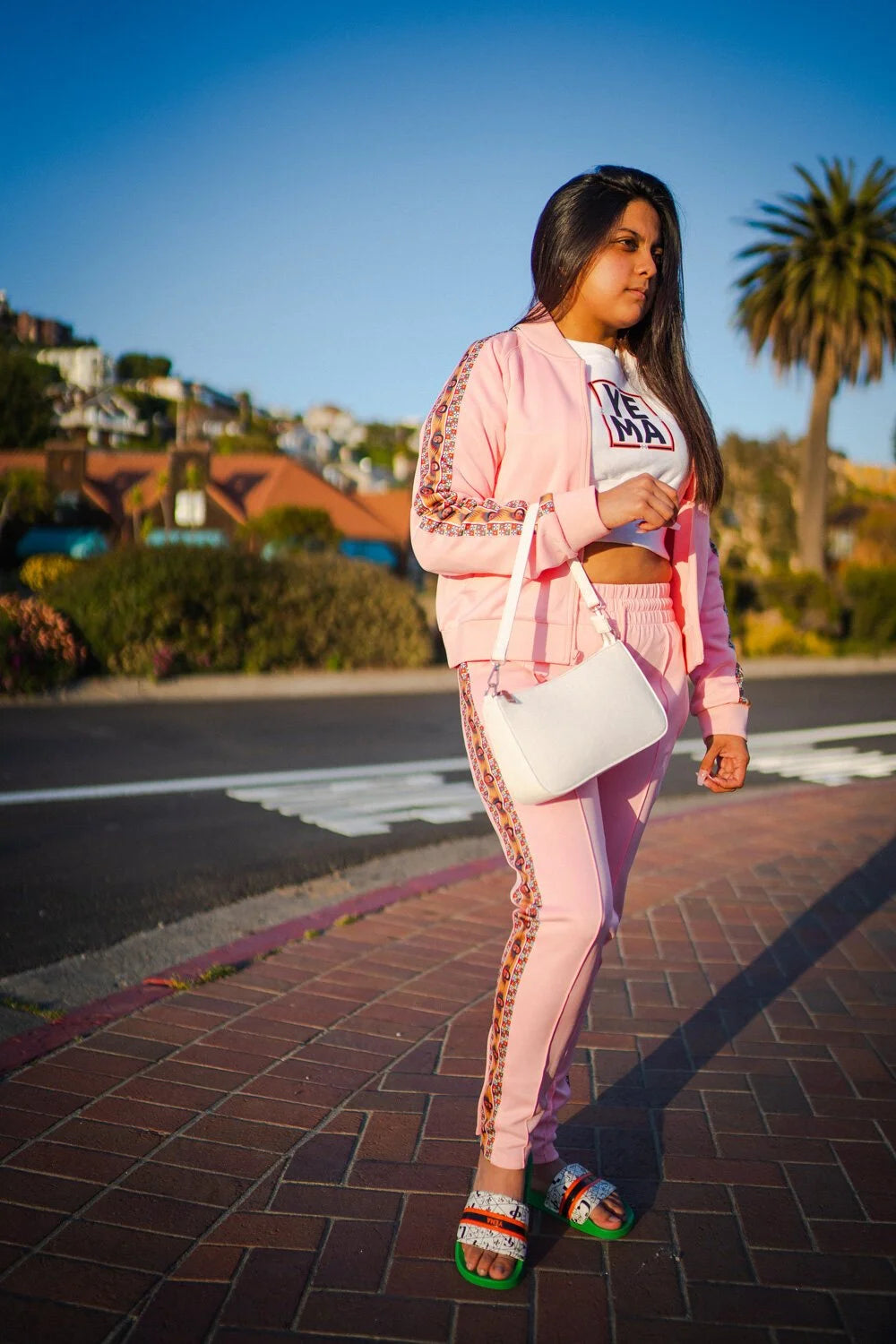 YEMA FIKIR slides Addis Green colorway with ancient Ethiopian language pattern across strap