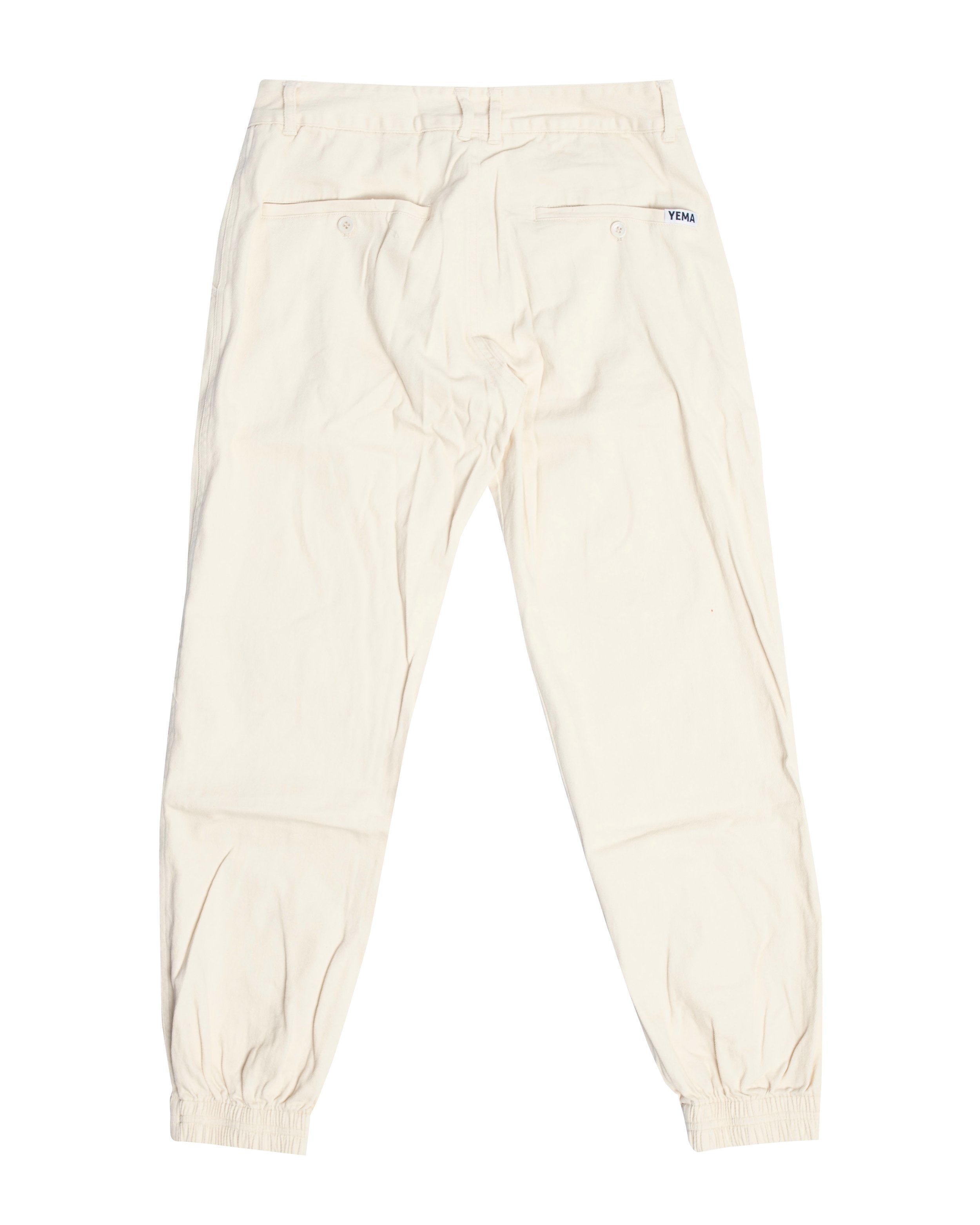 YEMA GJH Joggers in Lalibela featuring distressed detailing and Ethiopian heritage motifs with slim fit