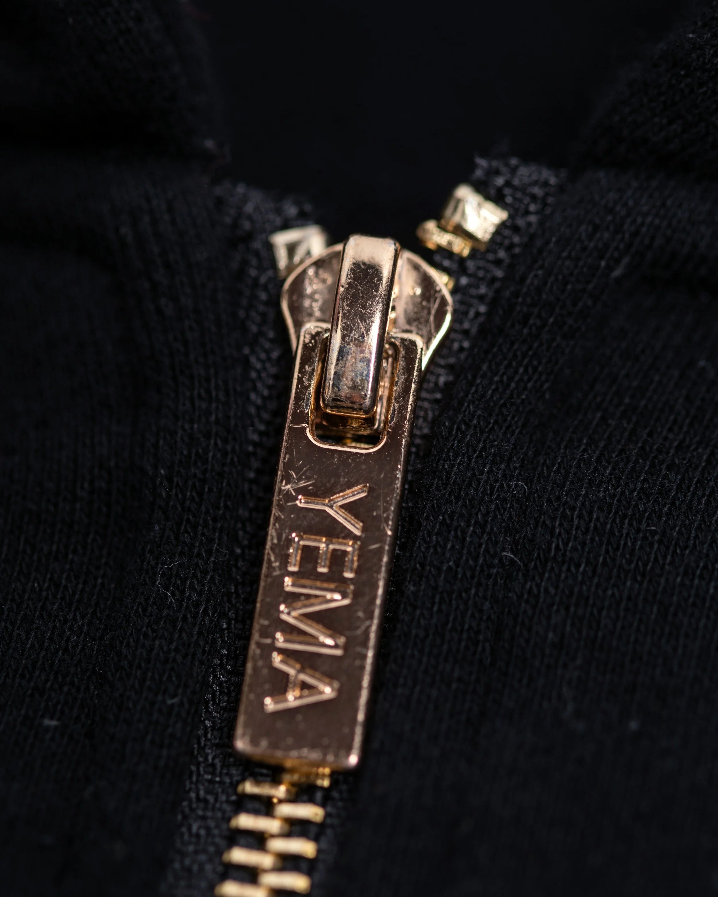 YEMA GJH zip up hoodie in Addis Black featuring skating giraffe with headphones and gold hardware