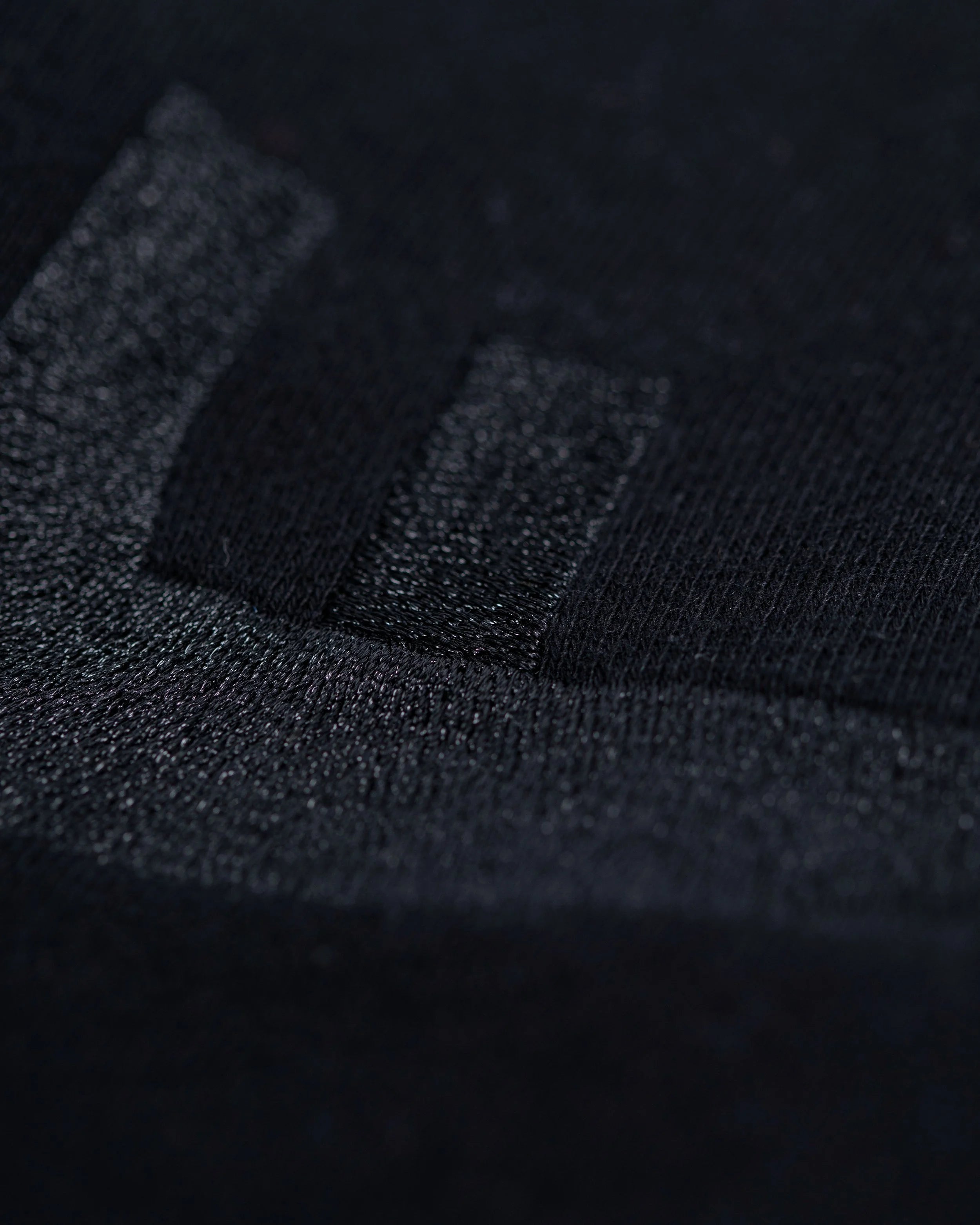 Heritage zip hoodie with GJH philosophy, gold engraved pockets, and 100% cotton in Addis Black