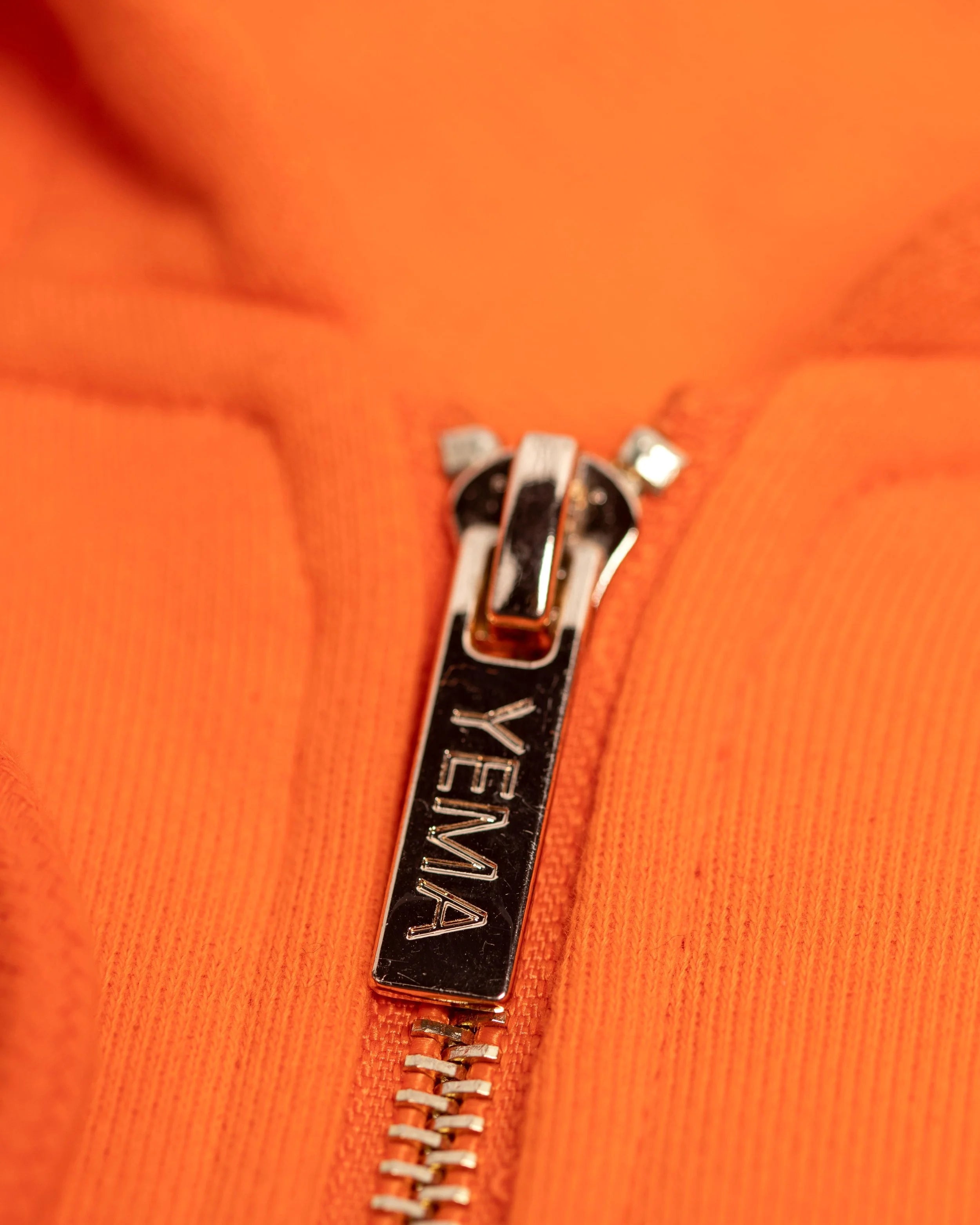 "YEMA GJH zip up hoodie in Maasai Mara featuring skating giraffe with headphones and gold hardware