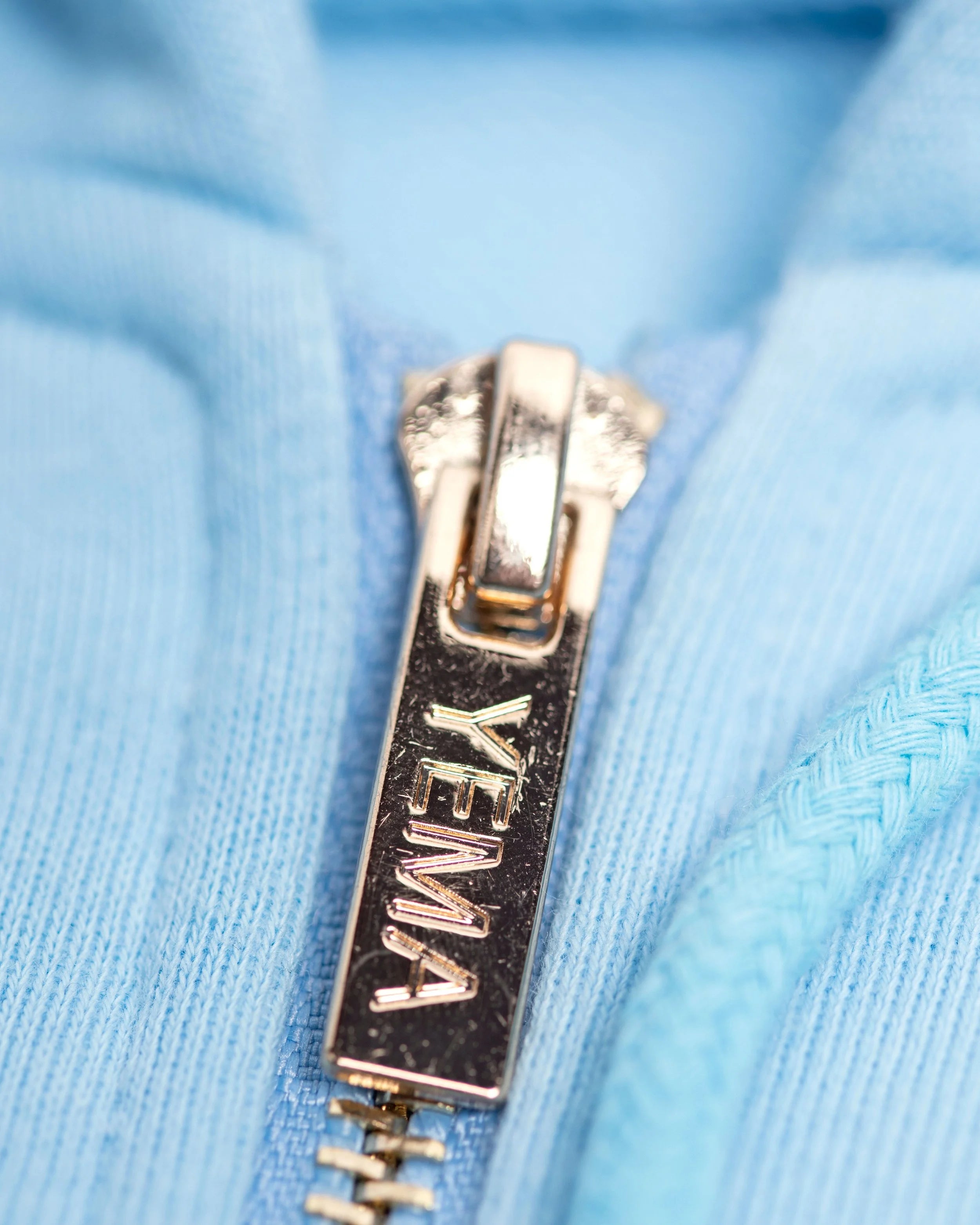 YEMA GJH zip up hoodie in Nairobi Sky featuring skating giraffe with headphones and gold hardware
