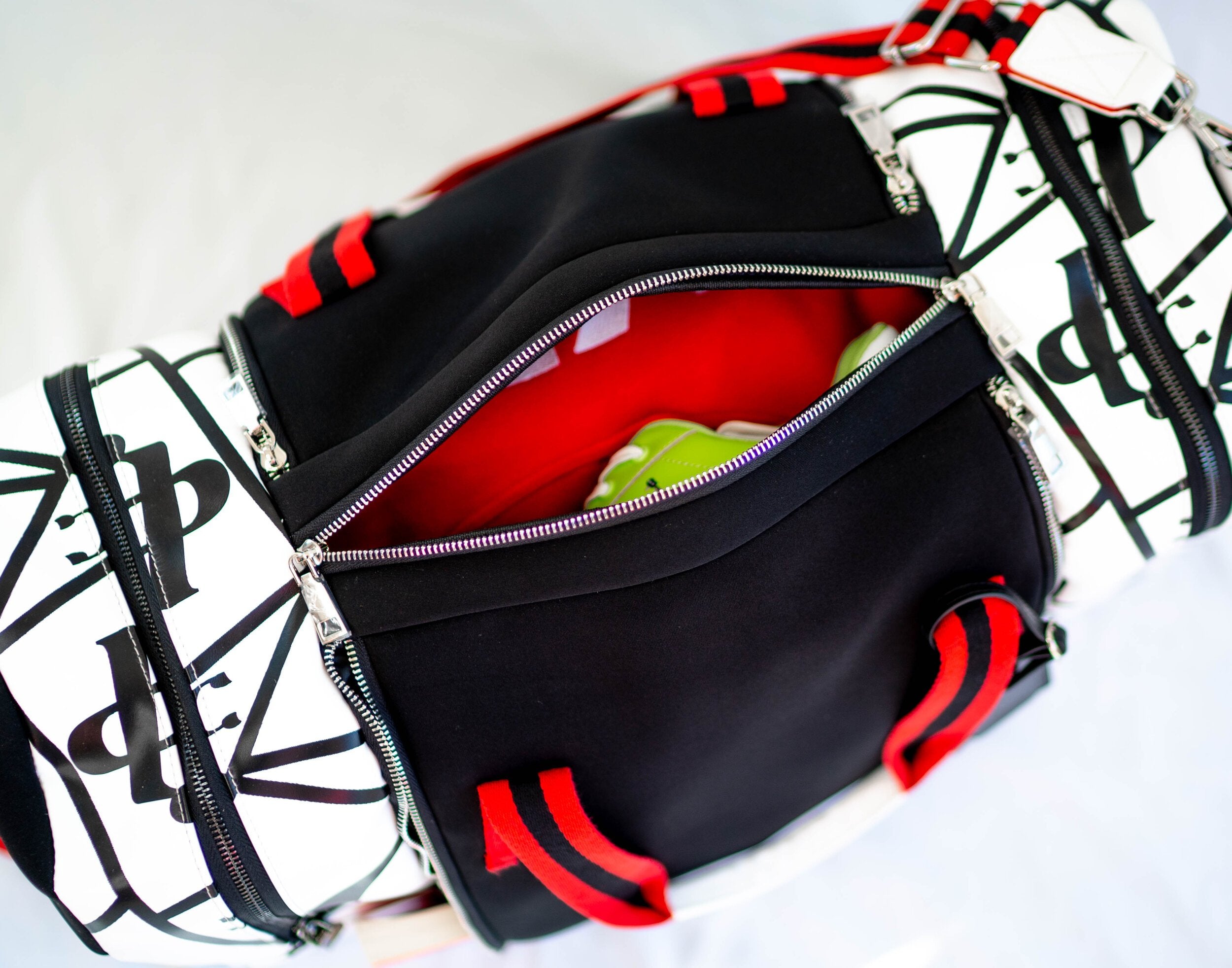 Interior view showing secure pockets for valuables and black polyester lining