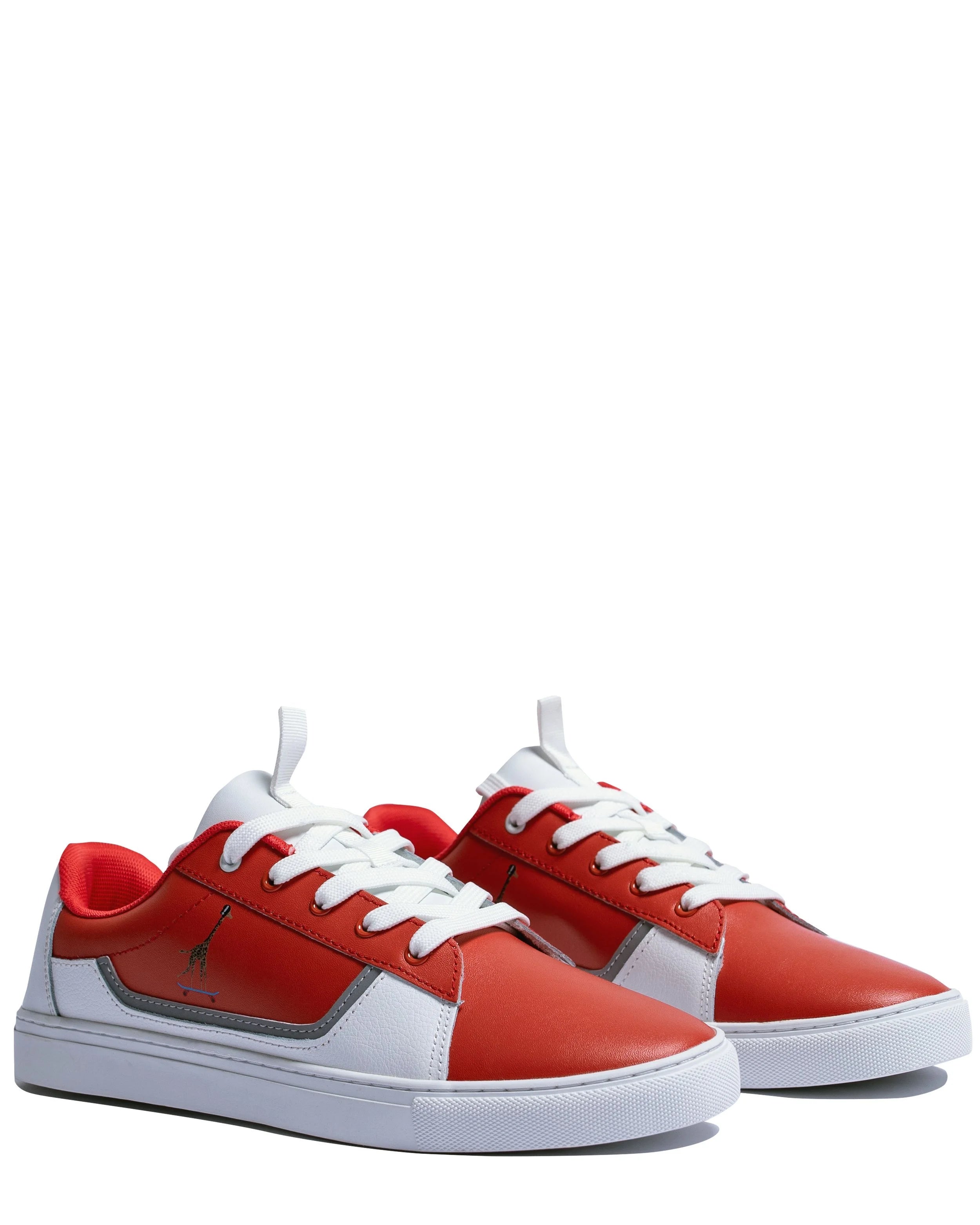 Side view of Addis Red leather sneakers showing tumbled leather skating ring and reflective giraffe detail