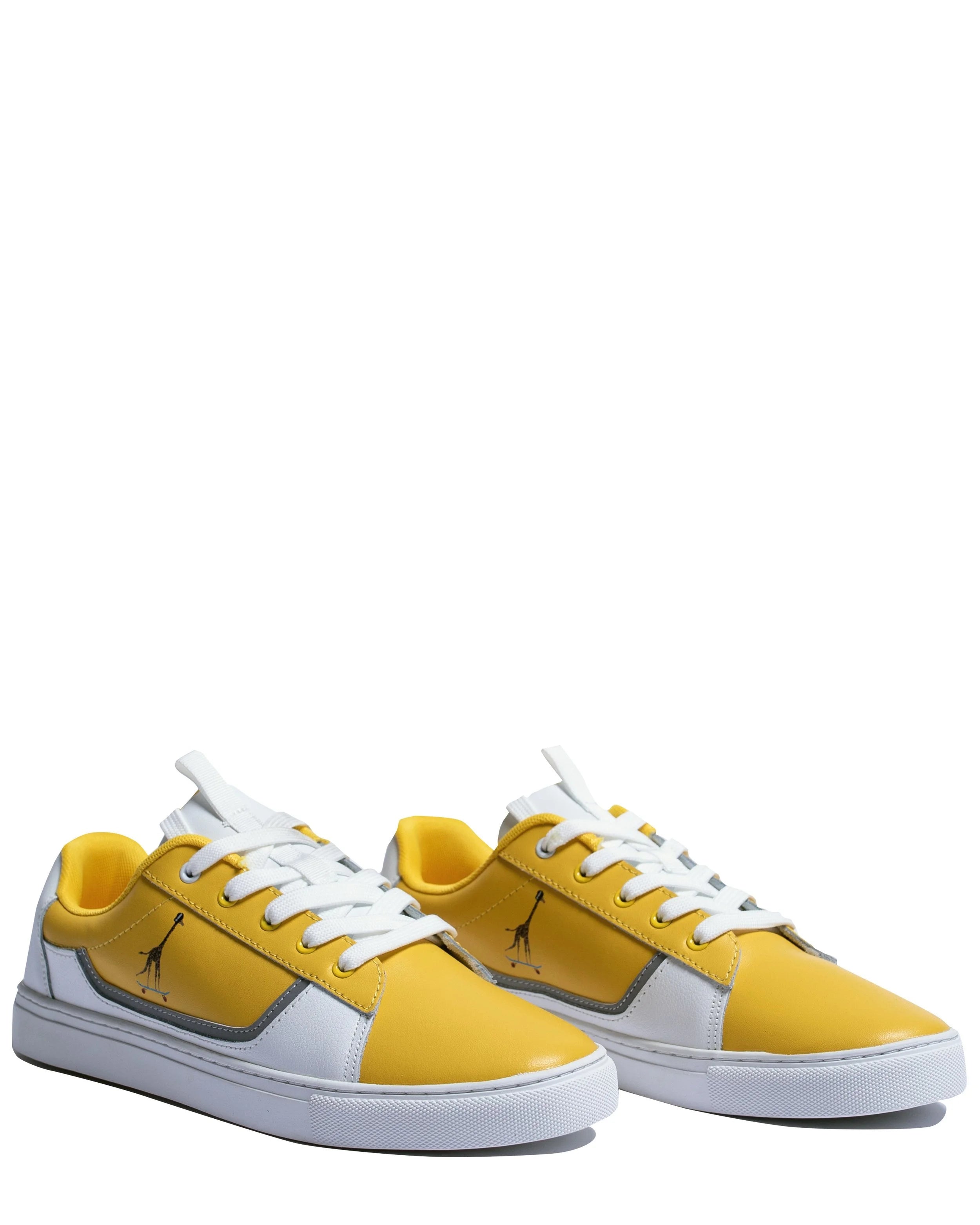 Side view of Addis Yellow leather sneakers showing tumbled leather skating ring and reflective giraffe detail