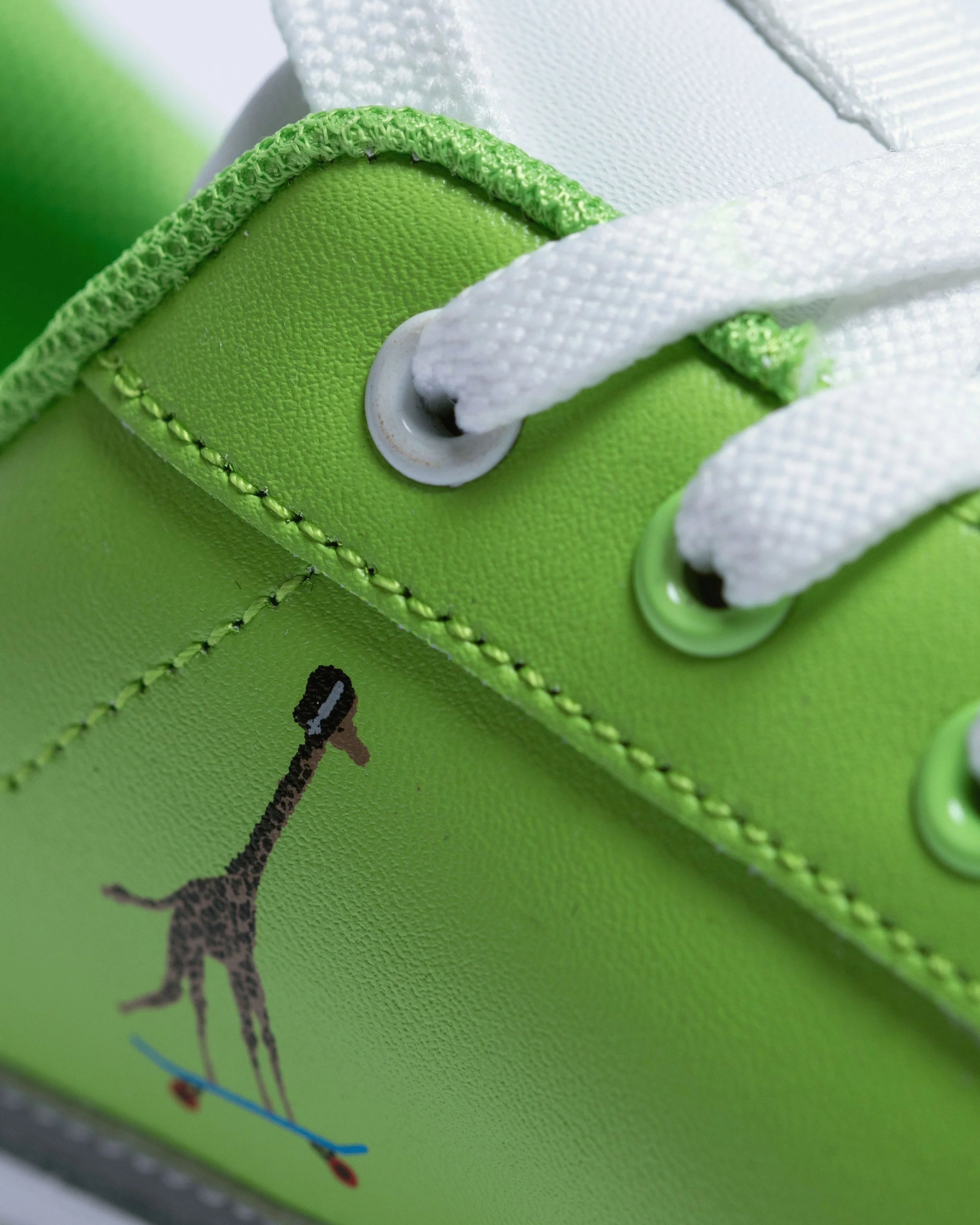 Detail of genuine leather construction with padded collar and comfortable insoles