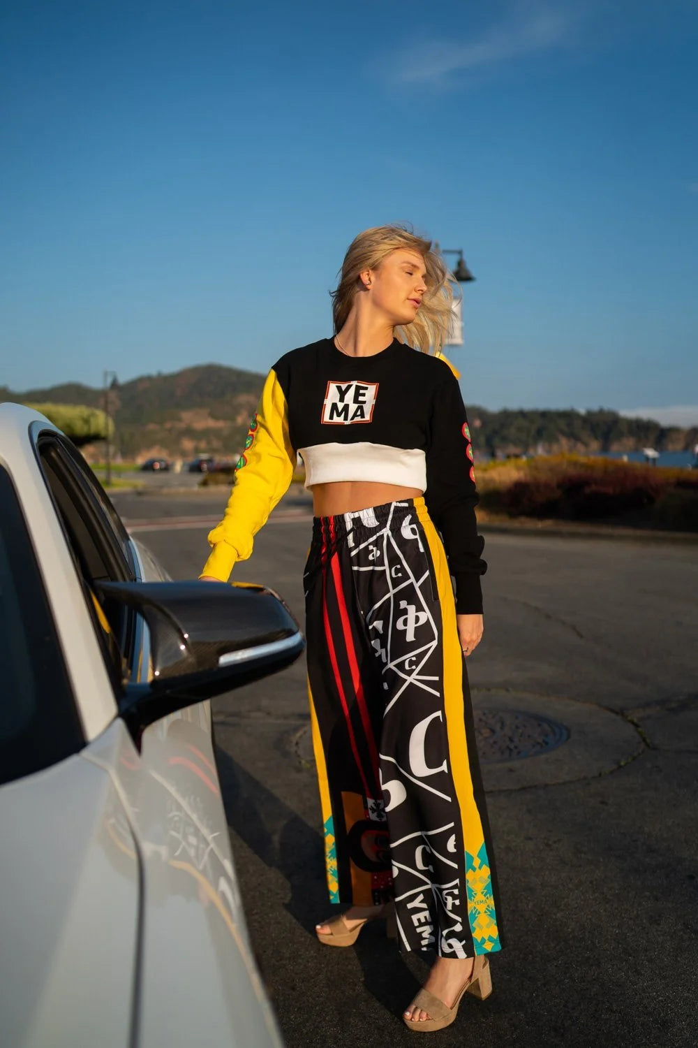 YEMA Jill Hamer pants in Addis Black featuring Amharic alphabets and Ethiopian motifs with wide relaxed fit