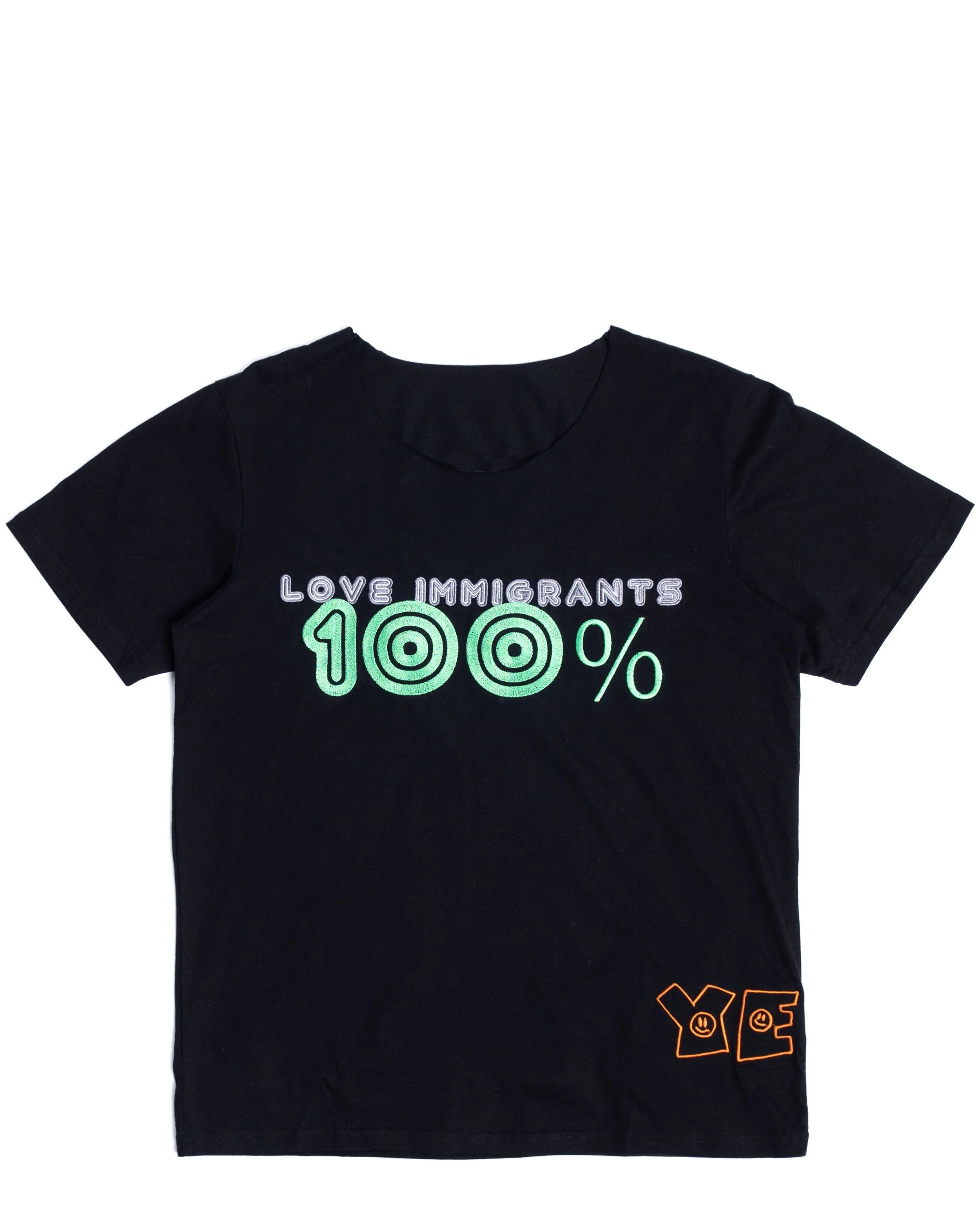 Front view of statement tee celebrating immigrants with bold embroidered messaging in black