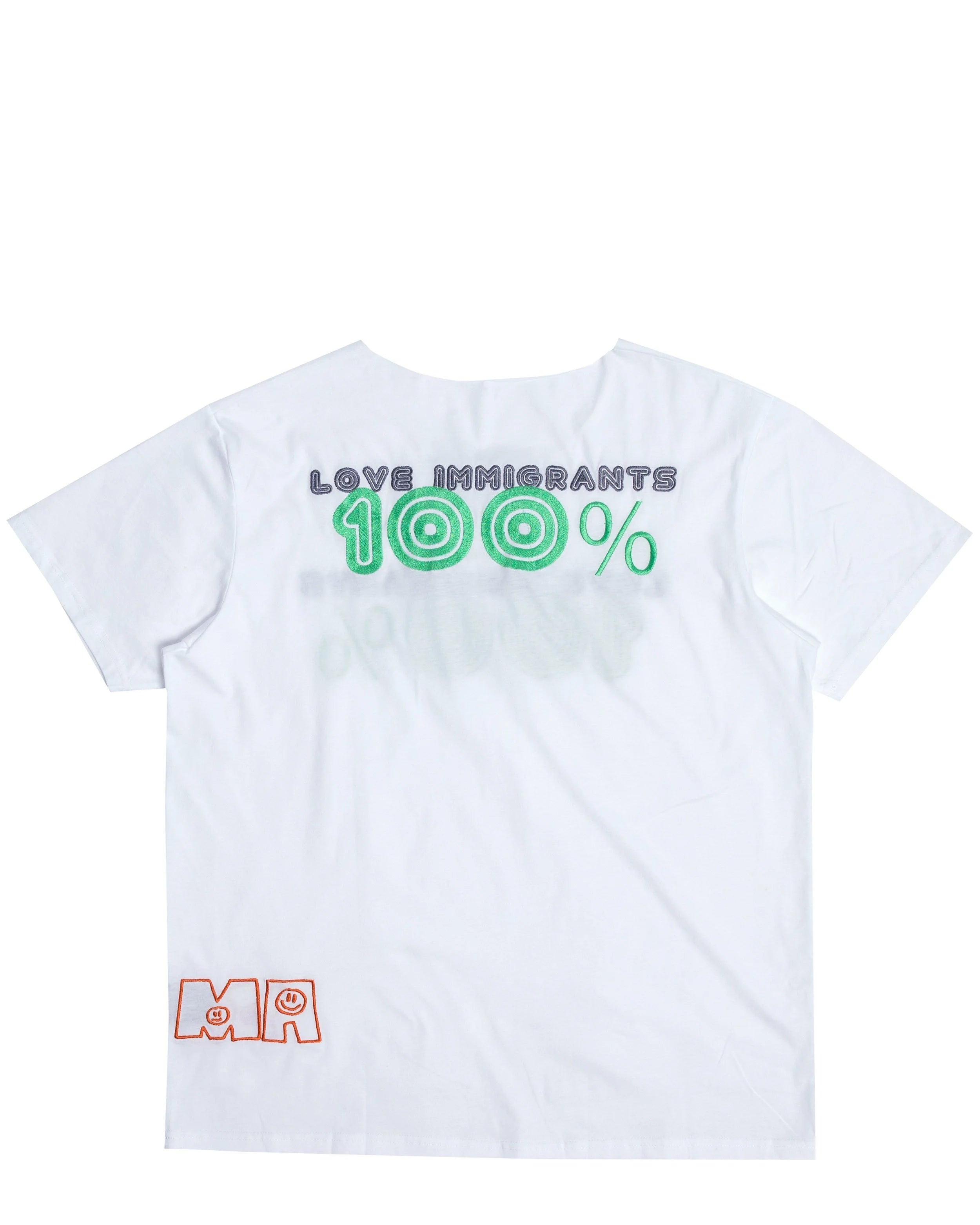 Back view of Love Immigrants tee displaying embroidered message and raw collar detail
