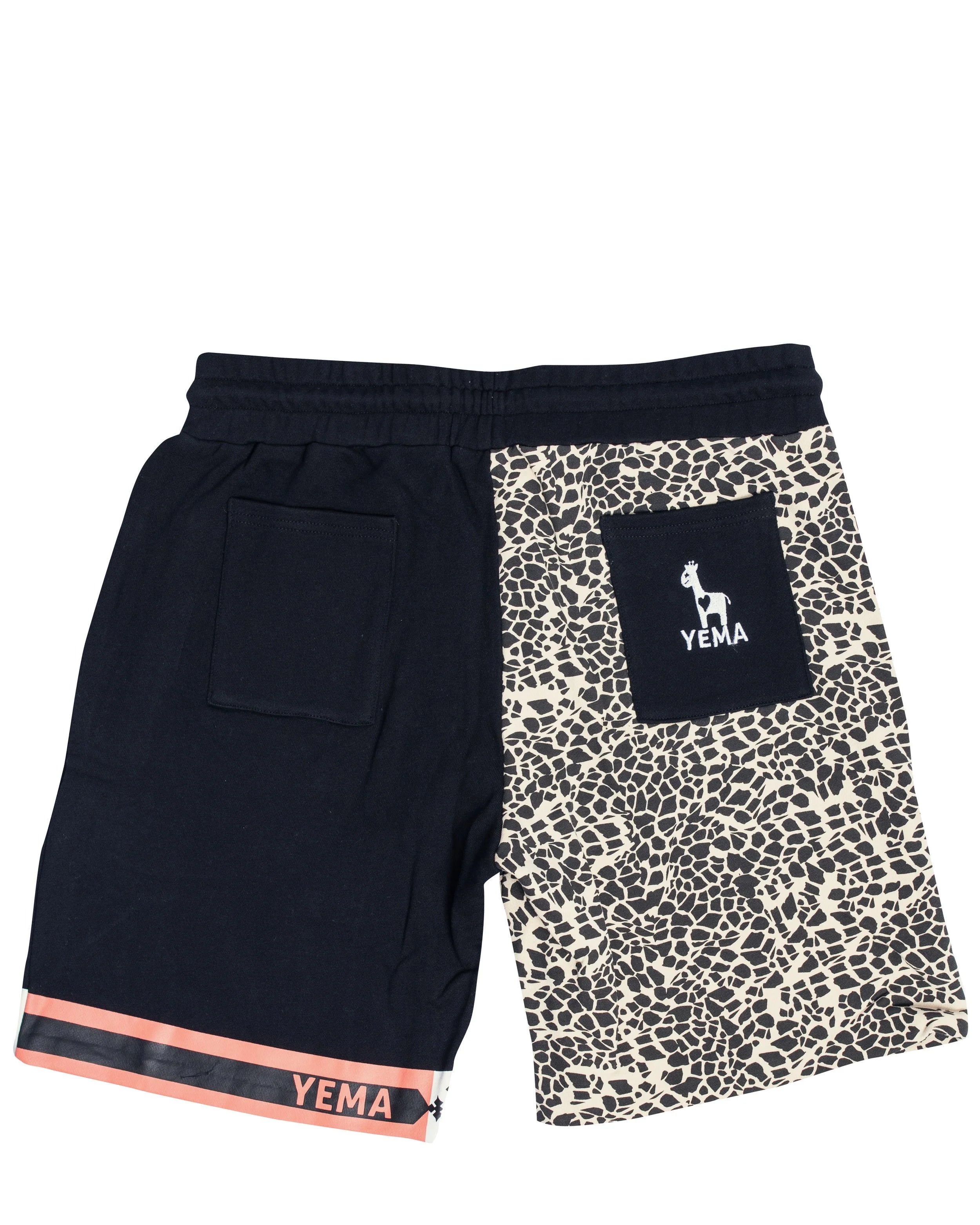 Back view of designer shorts with YEMA embroidery on pocket and cotton terry construction