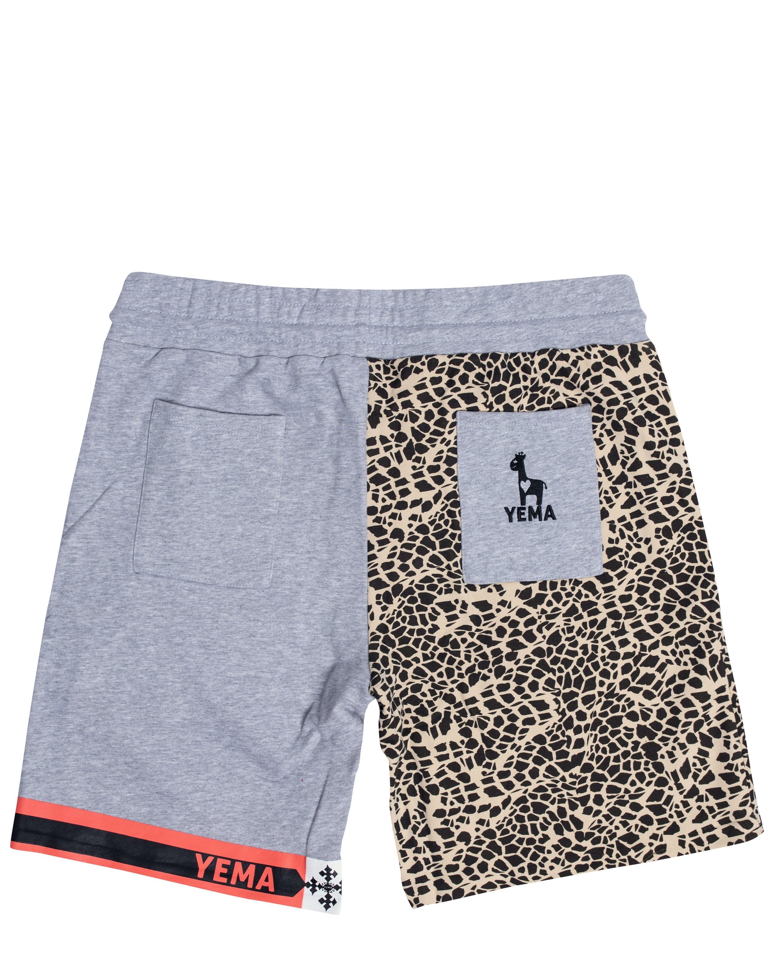 Back view of YEMA Meskel Giraffe shorts showing relaxed fit and clay colorway