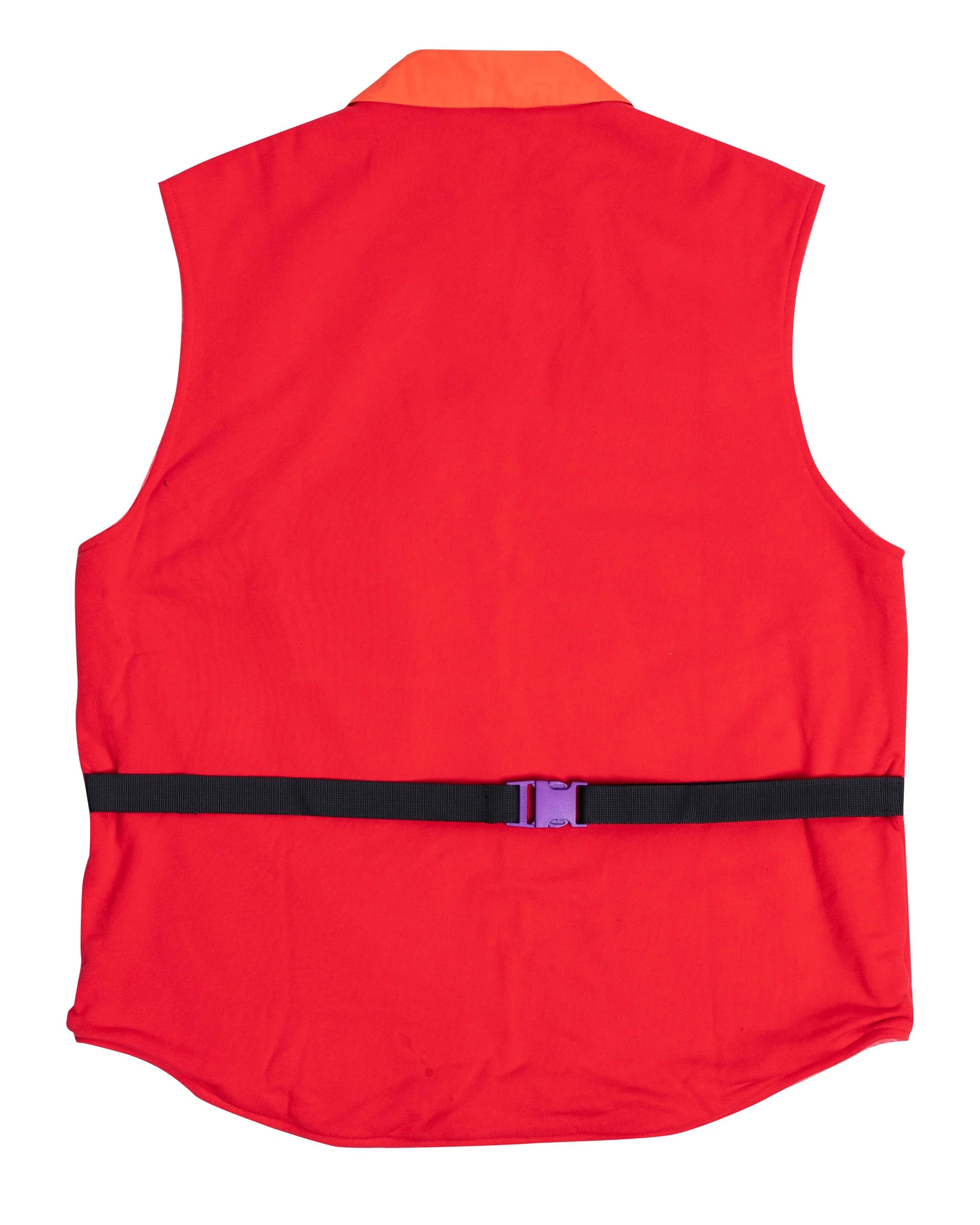 Back detail of YEMA vest displaying adjustable straps with accented buckle