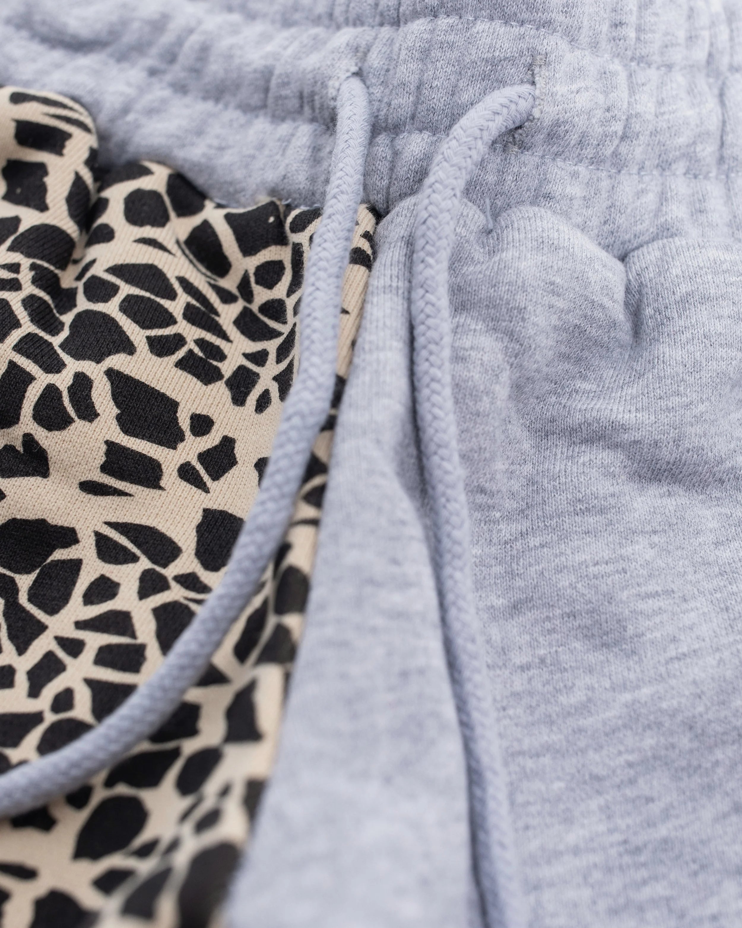 Kids' heritage shorts with YEMA skating giraffe and 100% cotton terry for active play